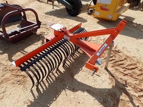 used rock rakes for tractors